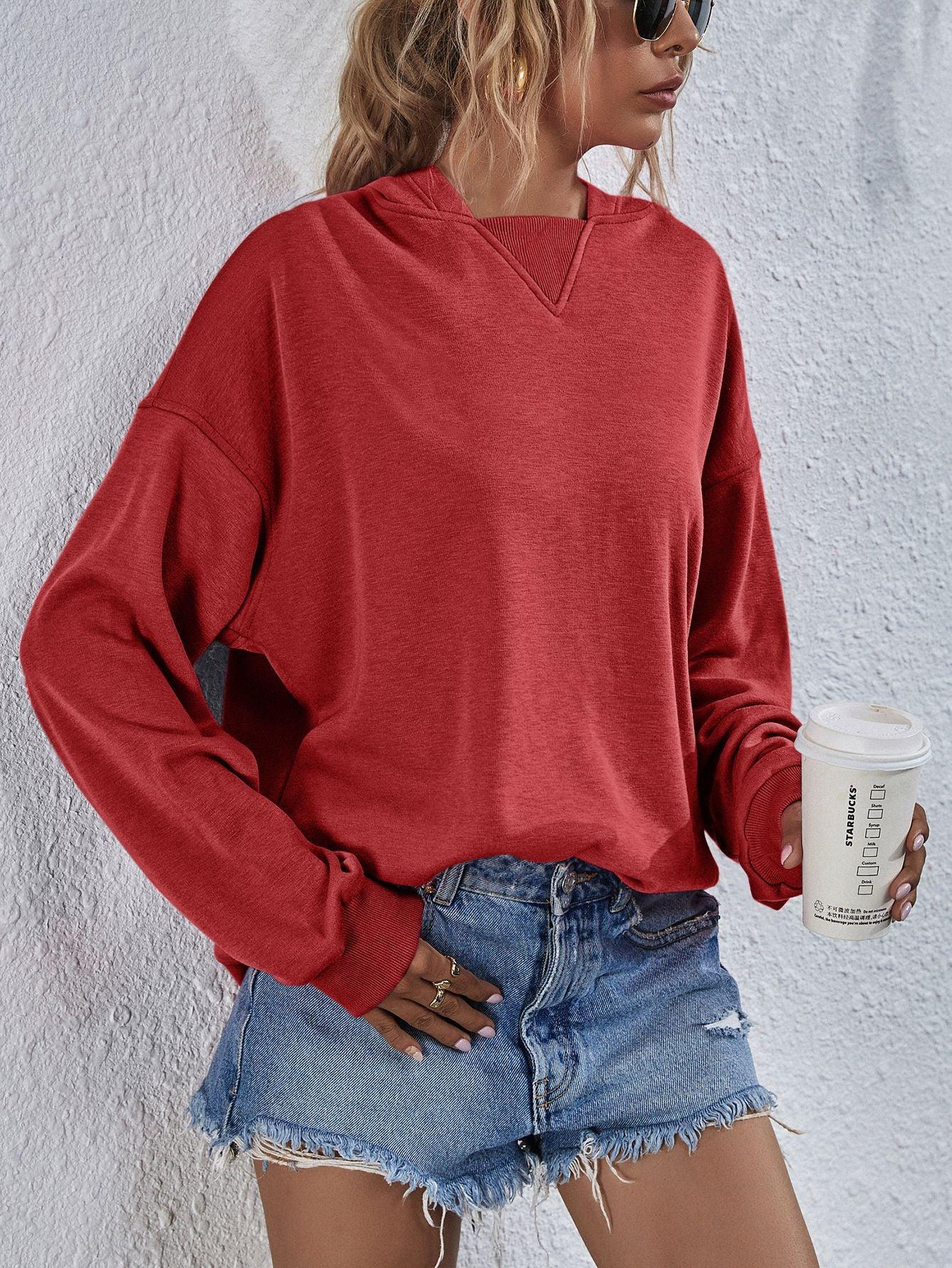 Get trendy with Dropped Shoulder Slit Hoodie - Tops available at Styles Code. Grab yours today!