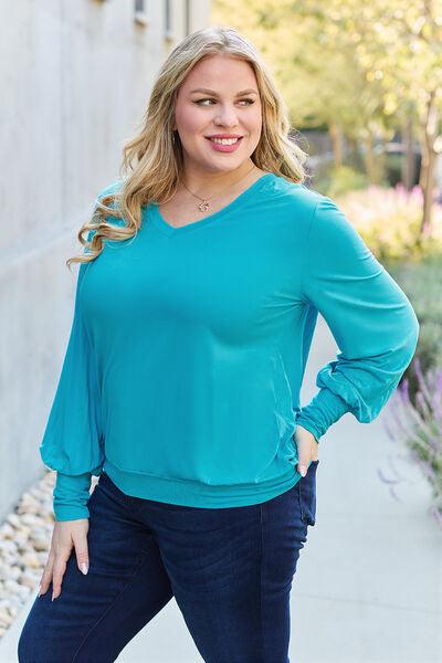Get trendy with Full Size V-Neck Lantern Sleeve Blouse - Blouse available at Styles Code. Grab yours today!