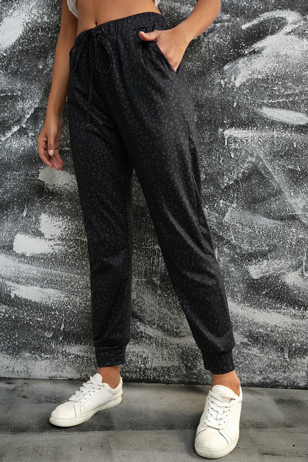 Get trendy with Double Take Leopard Print Joggers with Pockets - Joggers available at Styles Code. Grab yours today!
