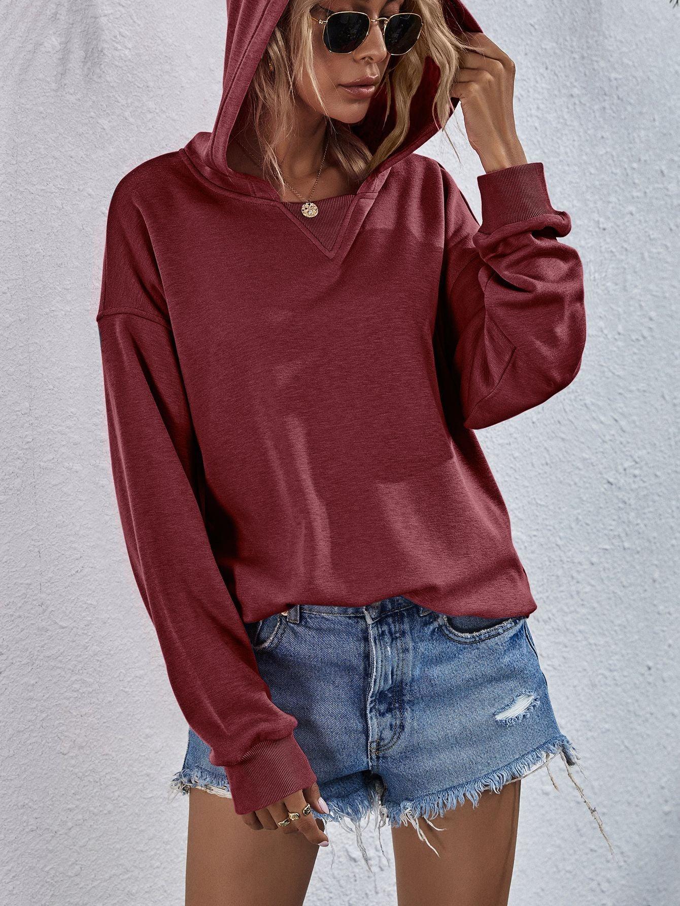 Get trendy with Dropped Shoulder Slit Hoodie - Tops available at Styles Code. Grab yours today!