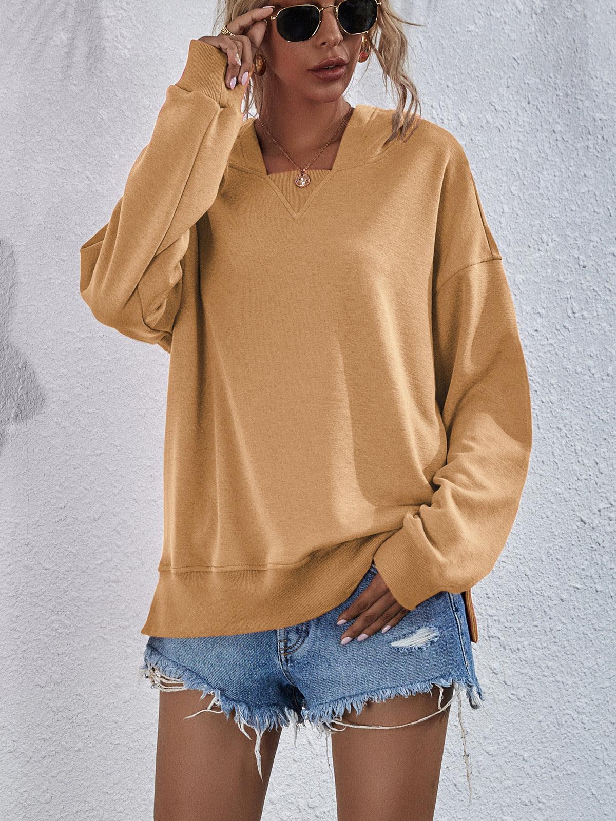 Get trendy with Dropped Shoulder Slit Hoodie - Tops available at Styles Code. Grab yours today!
