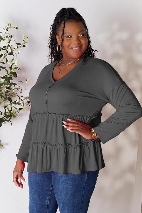 Get trendy with Half Button Ruffle Hem Blouse - Blouse available at Styles Code. Grab yours today!