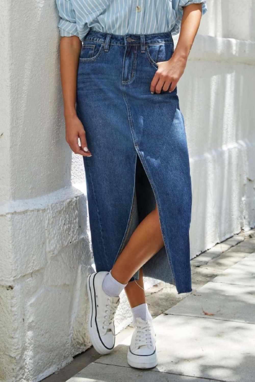 Get trendy with Slit Raw Hem Midi Denim Skirt -  available at Styles Code. Grab yours today!