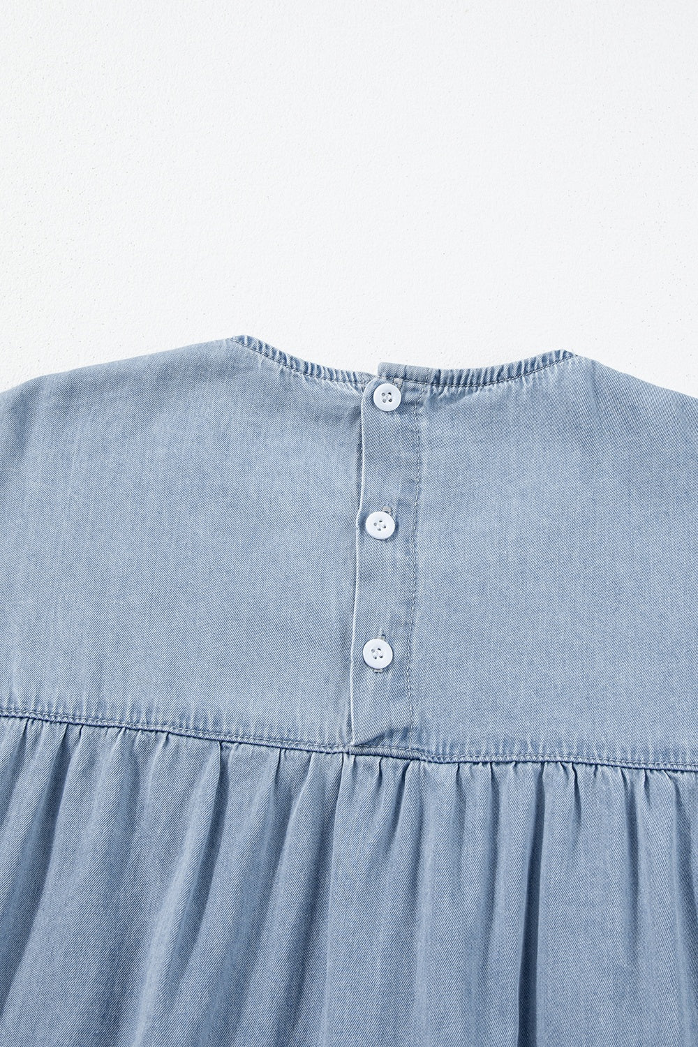 Get trendy with Ruffled Round Neck Cap Sleeve Denim Dress - Denim Dress available at Styles Code. Grab yours today!