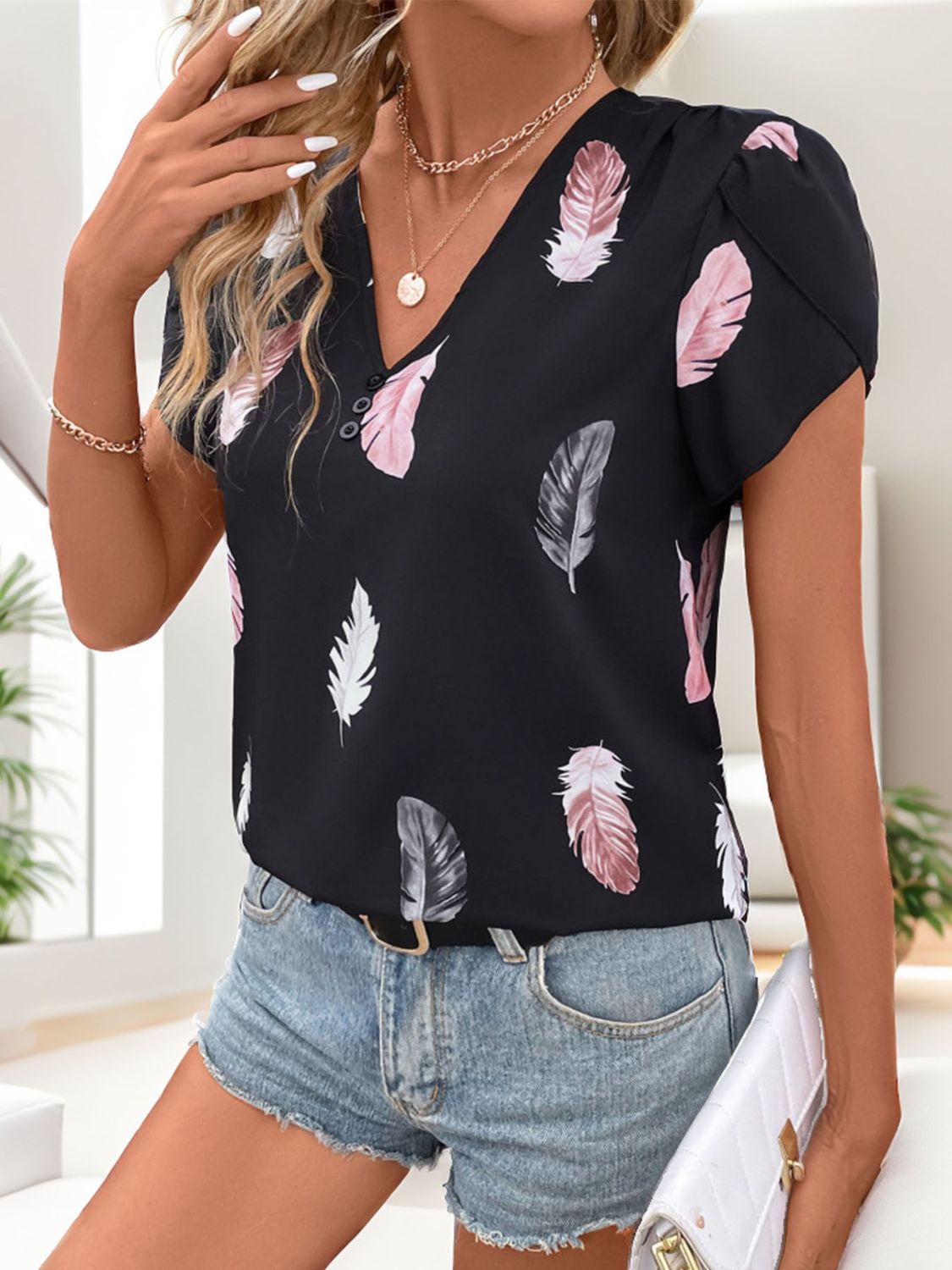 Get trendy with Printed V-Neck Short Sleeve Blouse - Top available at Styles Code. Grab yours today!