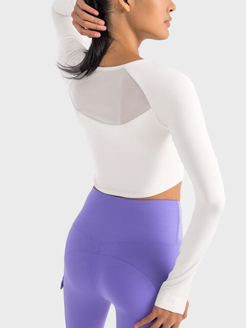 Get trendy with Millennia Square Neck Long Sleeve Cropped Sports Top - Activewear available at Styles Code. Grab yours today!