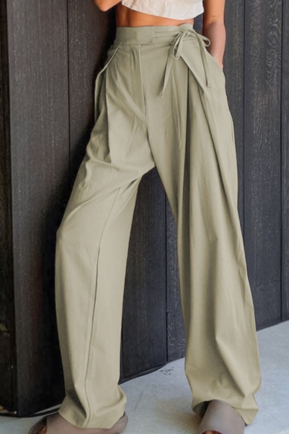 Get trendy with Tied High Waist Wide Leg Pants - Pants available at Styles Code. Grab yours today!