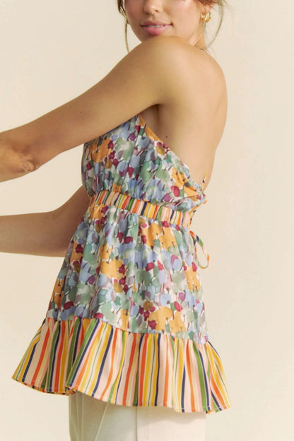 Get trendy with Floral Sleeveless Ruffle Top - Top available at Styles Code. Grab yours today!