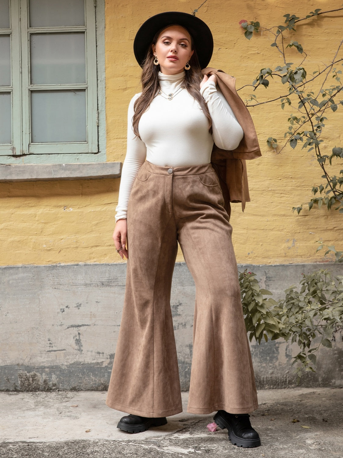 Get trendy with Plus Size Pocketed Flare Pants - Plus Size available at Styles Code. Grab yours today!