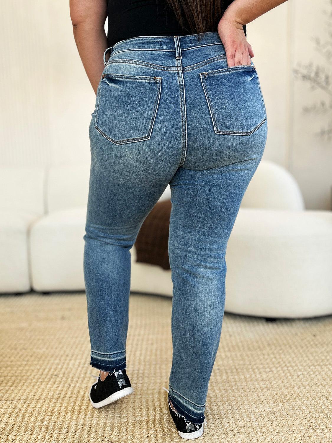 Get trendy with Full Size Mid Rise Hem Jeans - Plus Size available at Styles Code. Grab yours today!