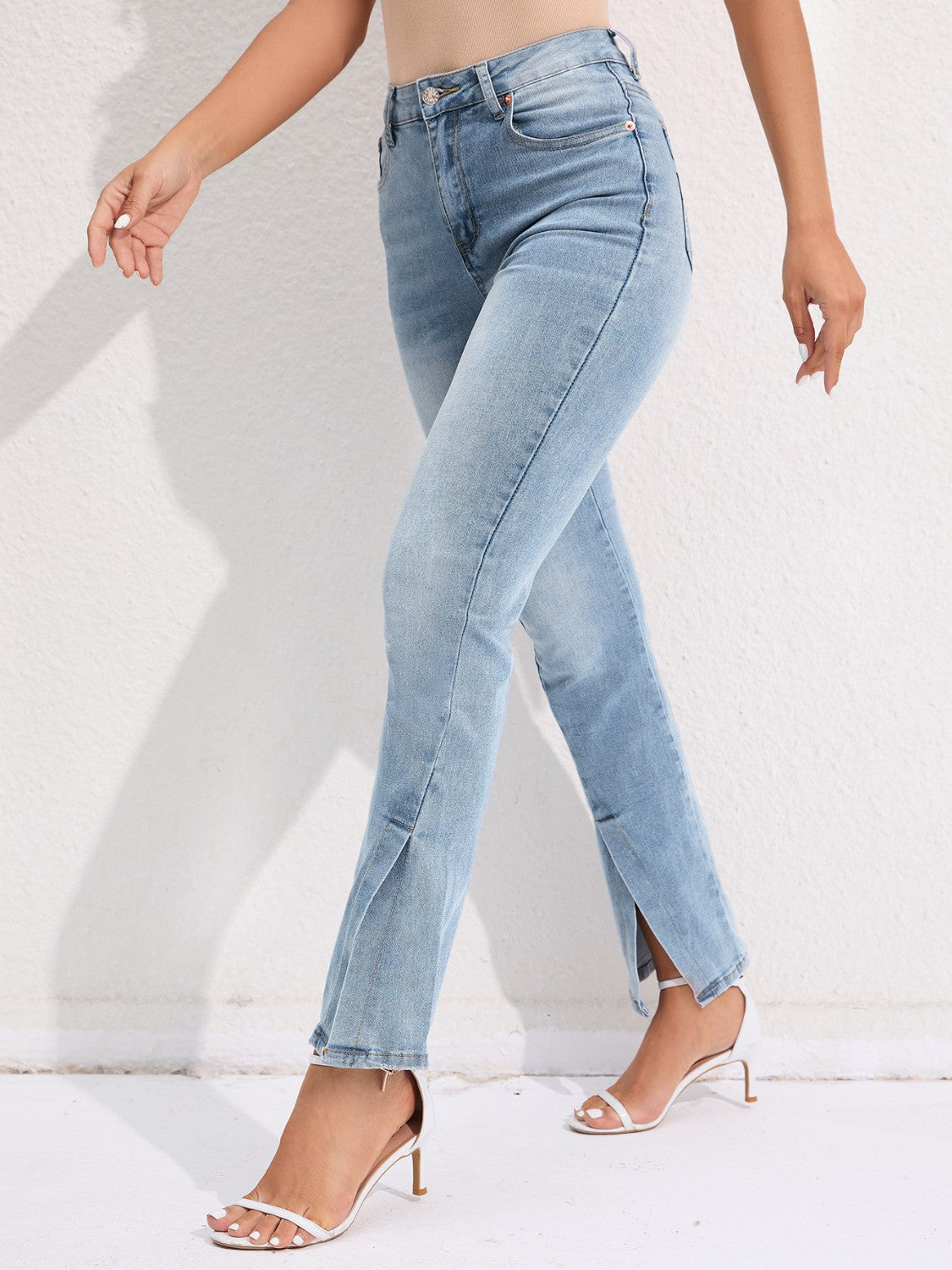 Get trendy with Slit Buttoned Jeans with Pockets - Jeans available at Styles Code. Grab yours today!