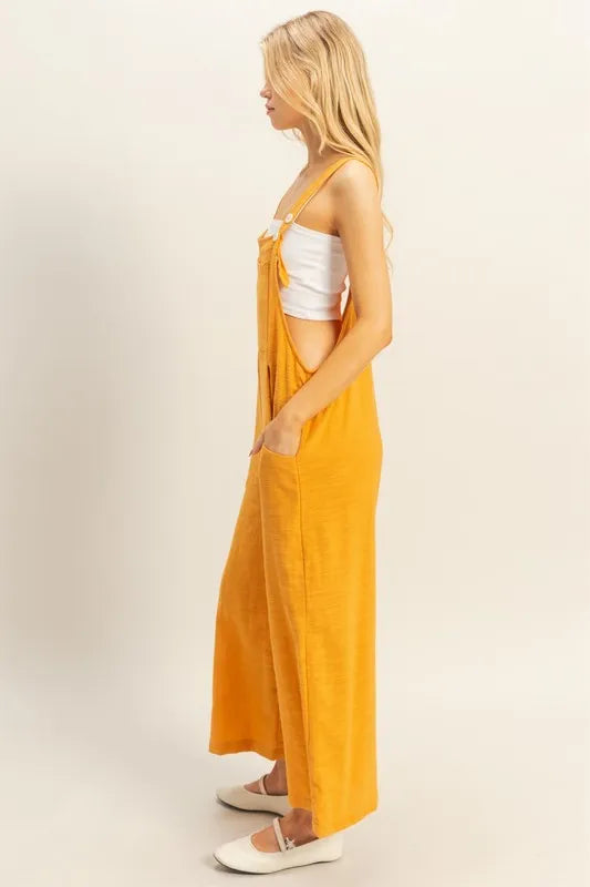 Get trendy with Textured Wide Leg Overall - Jumpsuit available at Styles Code. Grab yours today!