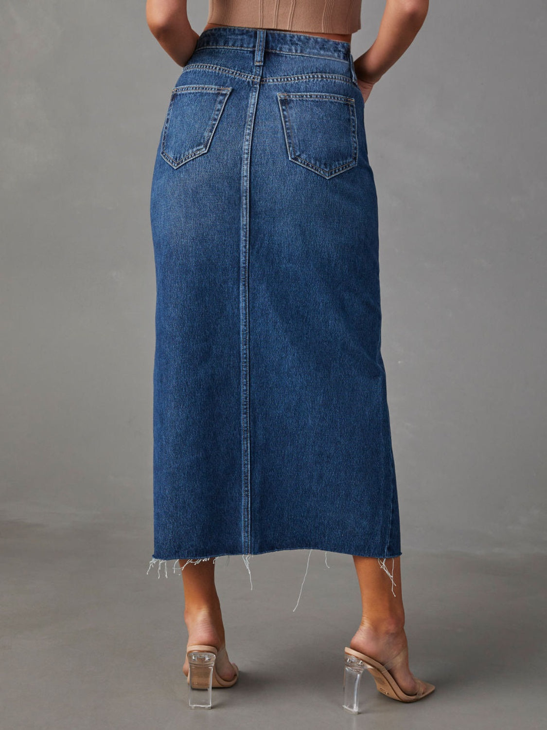 Get trendy with Slit Raw Hem Midi Denim Skirt -  available at Styles Code. Grab yours today!