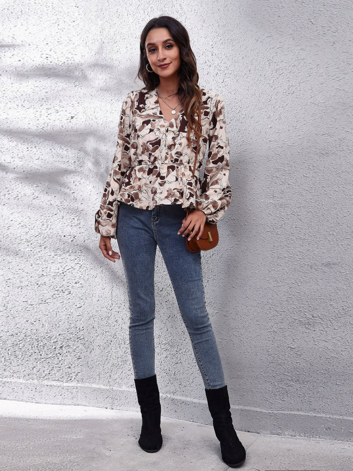 Get trendy with Ruched Printed V-Neck Long Sleeve Blouse - Blouse available at Styles Code. Grab yours today!