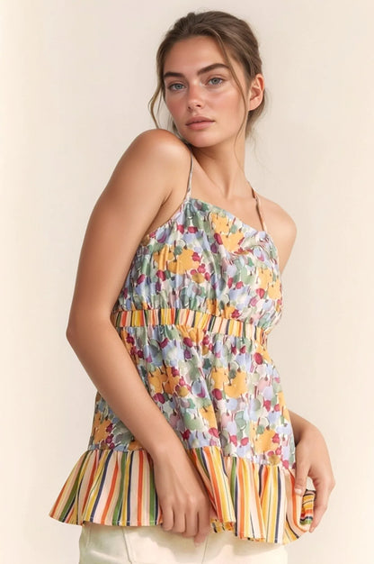 Get trendy with Floral Sleeveless Ruffle Top - Top available at Styles Code. Grab yours today!