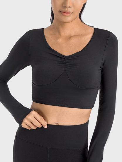 Get trendy with Ruched Cropped Long Sleeve Sports Top - Activewear available at Styles Code. Grab yours today!