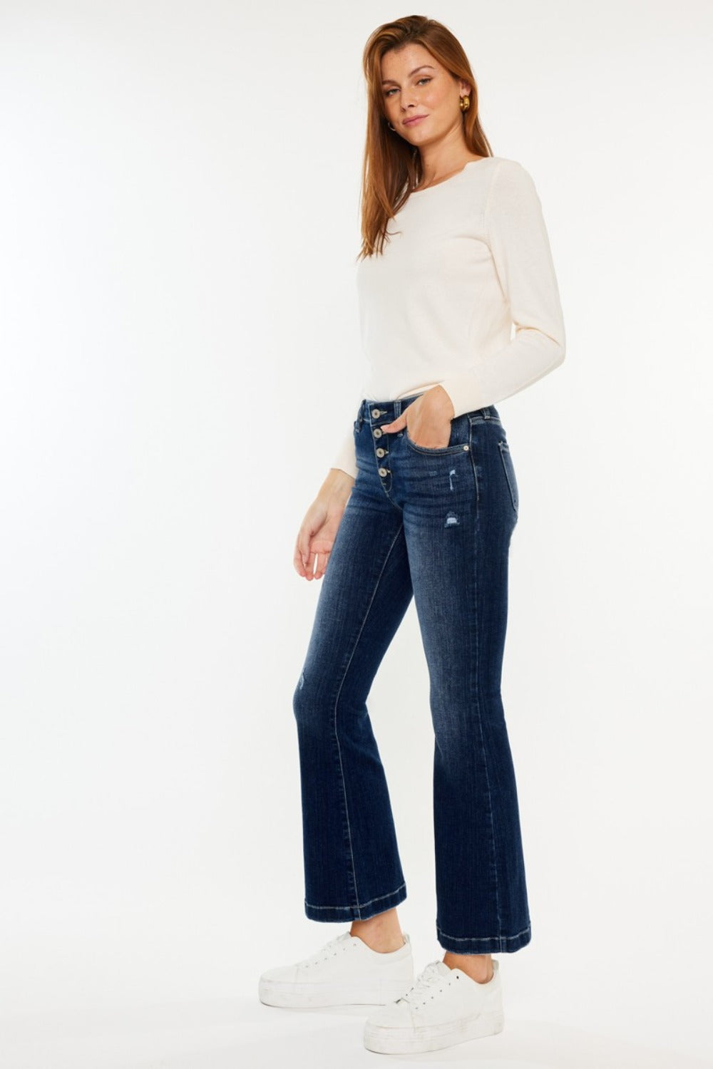 Get trendy with Kancan Mid Rise Button Fly Flare Jeans - Jeans available at Styles Code. Grab yours today!