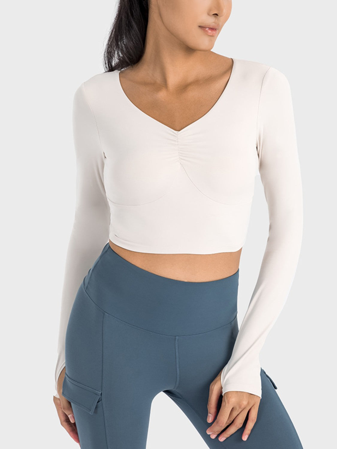 Get trendy with Ruched Cropped Long Sleeve Sports Top - Activewear available at Styles Code. Grab yours today!