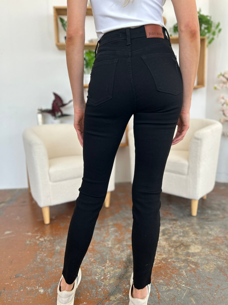 Get trendy with Judy Blue Full Size Distressed Tummy Control High Waist Skinny Jeans - Plus Size available at Styles Code. Grab yours today!