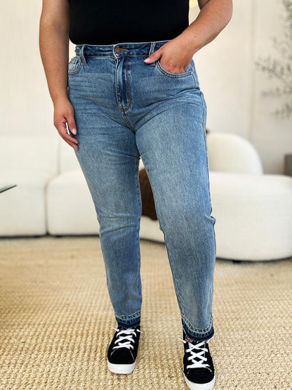 Get trendy with Full Size Mid Rise Hem Jeans - Plus Size available at Styles Code. Grab yours today!