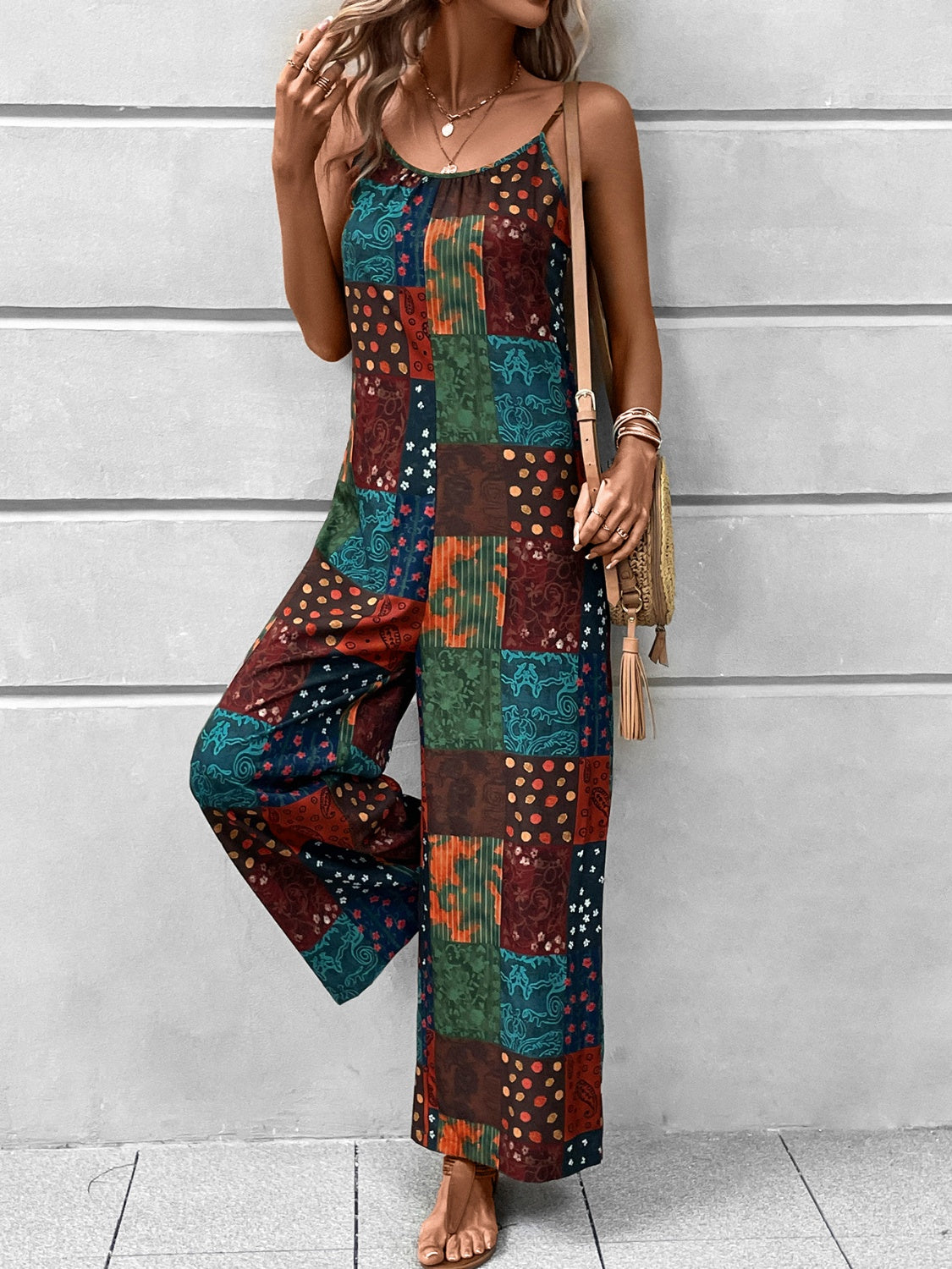 Get trendy with Printed Scoop Neck Spaghetti Strap Jumpsuit - Jumpsuit available at Styles Code. Grab yours today!