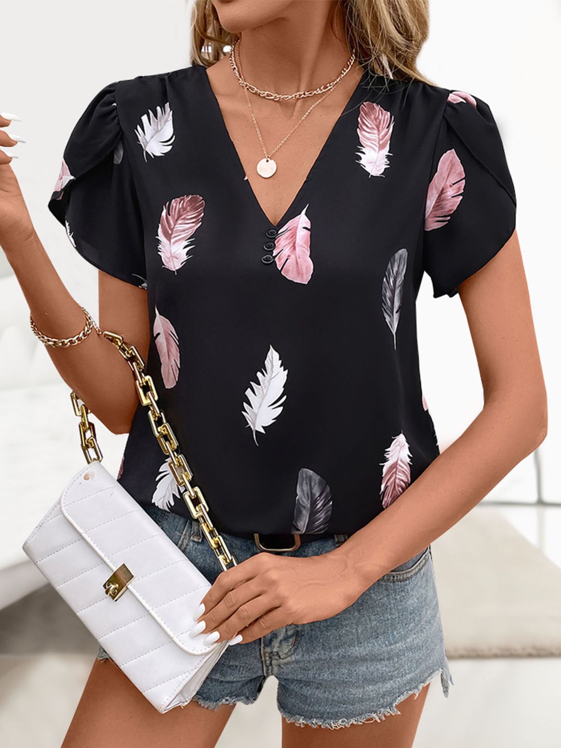 Get trendy with Printed V-Neck Short Sleeve Blouse - Top available at Styles Code. Grab yours today!