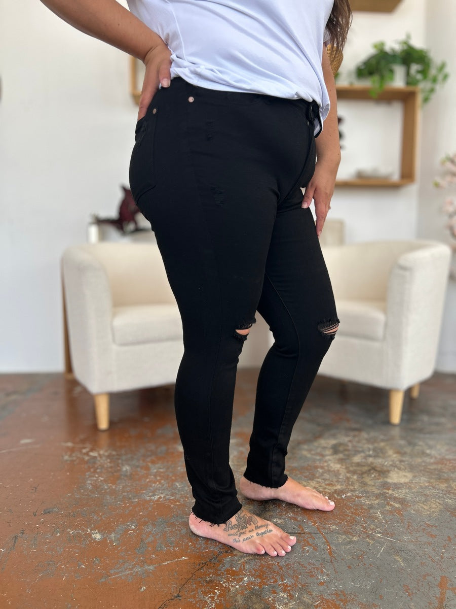 Get trendy with Judy Blue Full Size Distressed Tummy Control High Waist Skinny Jeans - Plus Size available at Styles Code. Grab yours today!