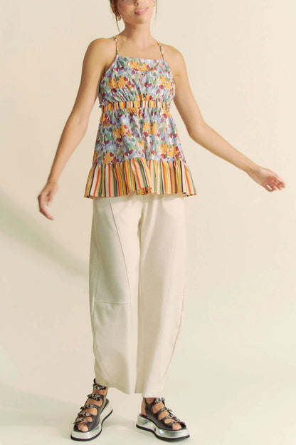 Get trendy with Floral Sleeveless Ruffle Top - Top available at Styles Code. Grab yours today!