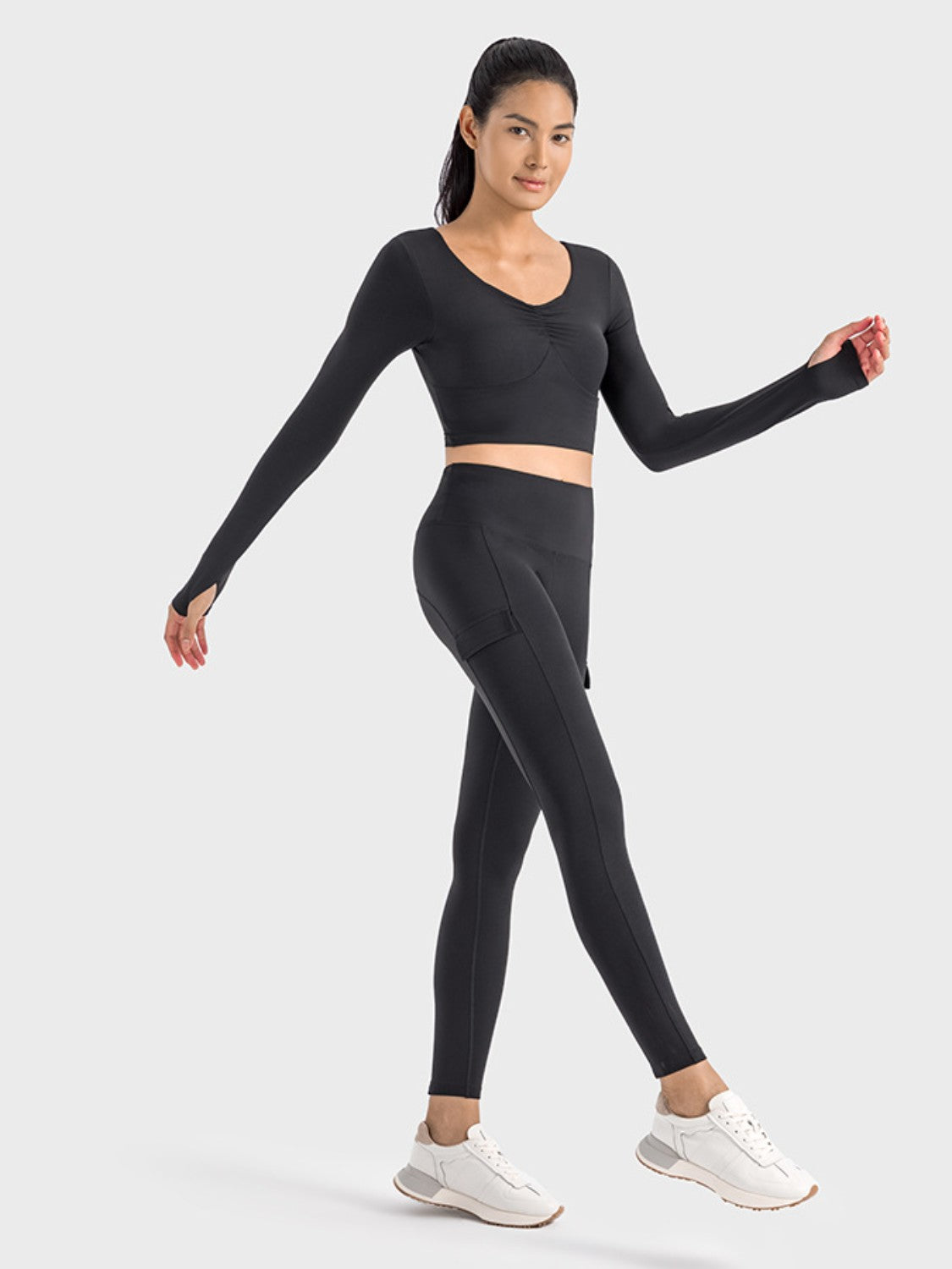 Get trendy with Ruched Cropped Long Sleeve Sports Top - Activewear available at Styles Code. Grab yours today!