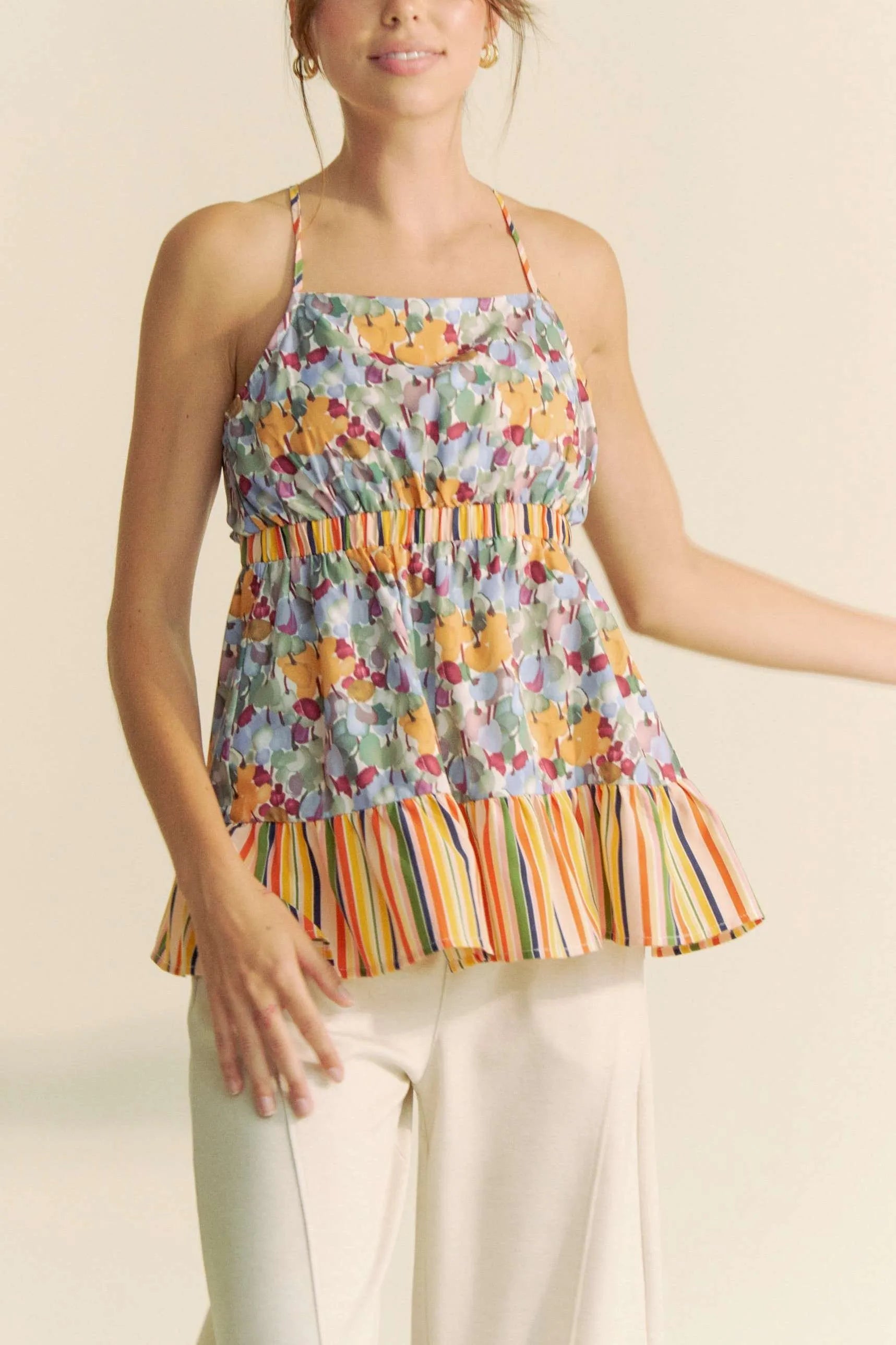 Get trendy with Floral Sleeveless Ruffle Top - Top available at Styles Code. Grab yours today!