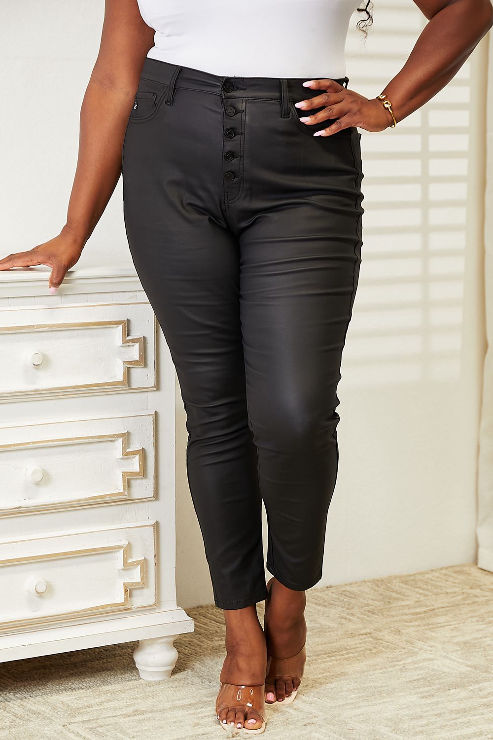 Get trendy with Kancan Full Size High Rise Black Coated Ankle Skinny Jeans - Plus Size available at Styles Code. Grab yours today!