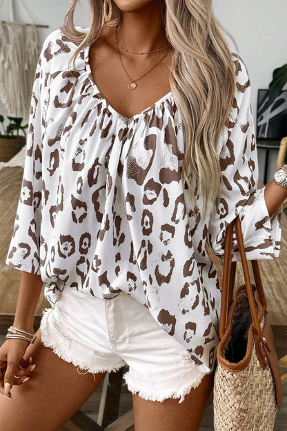 Get trendy with V-Neck Three-Quarter Sleeve Blouse - Blouse available at Styles Code. Grab yours today!