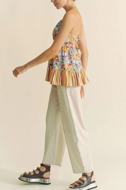 Get trendy with Floral Sleeveless Ruffle Top - Top available at Styles Code. Grab yours today!