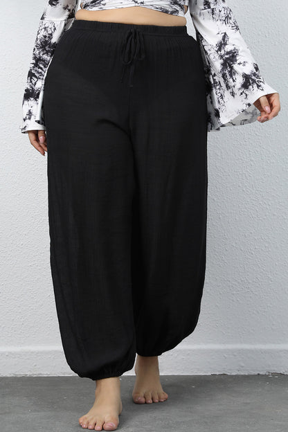 Get trendy with Plus Size Drawstring Jogger Pants - Plus Size available at Styles Code. Grab yours today!