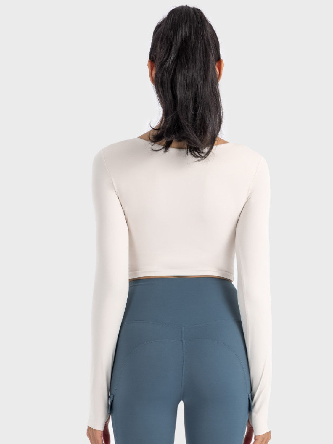 Get trendy with Ruched Cropped Long Sleeve Sports Top - Activewear available at Styles Code. Grab yours today!