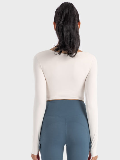 Get trendy with Ruched Cropped Long Sleeve Sports Top - Activewear available at Styles Code. Grab yours today!