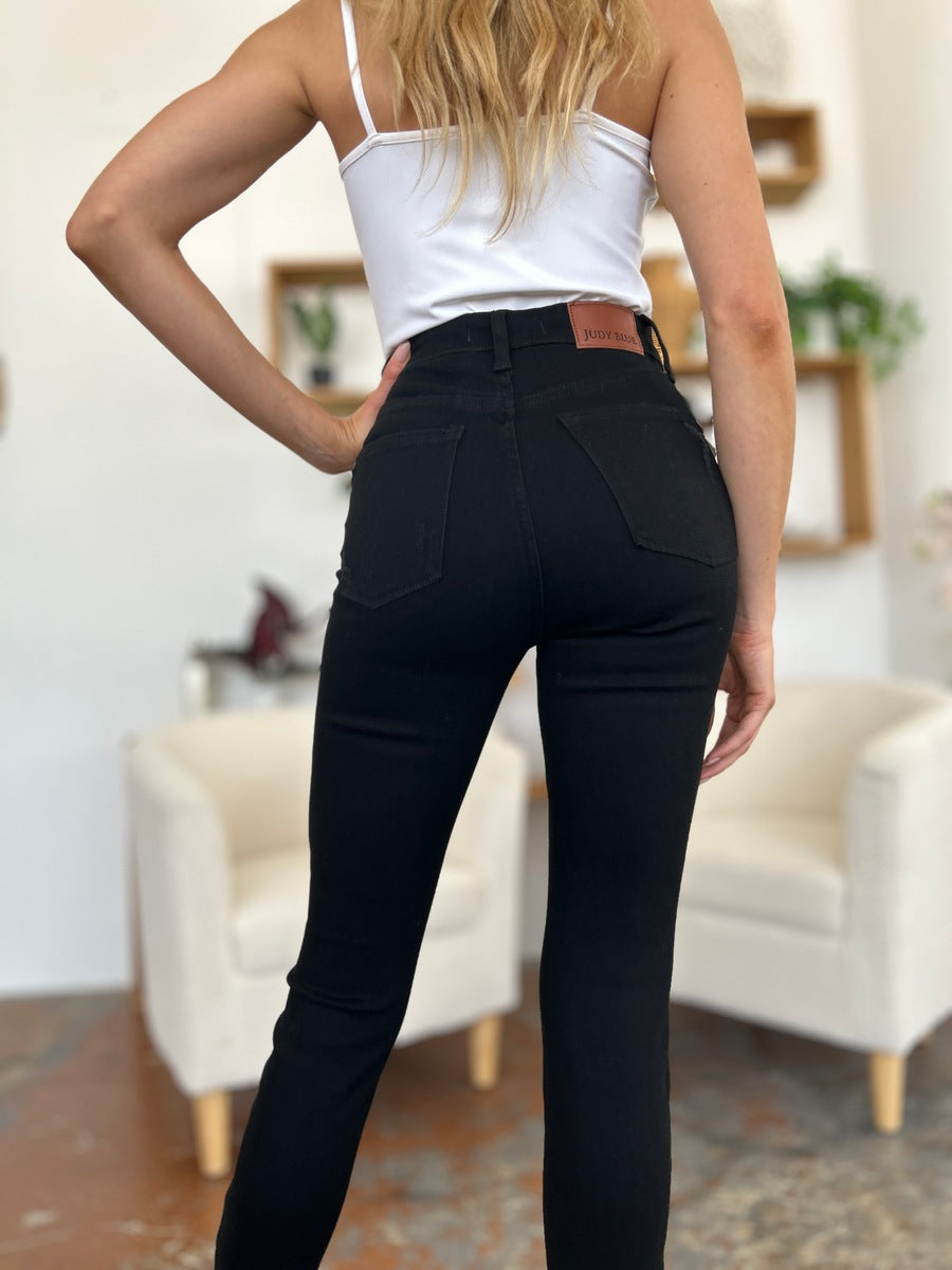 Get trendy with Judy Blue Full Size Distressed Tummy Control High Waist Skinny Jeans - Plus Size available at Styles Code. Grab yours today!