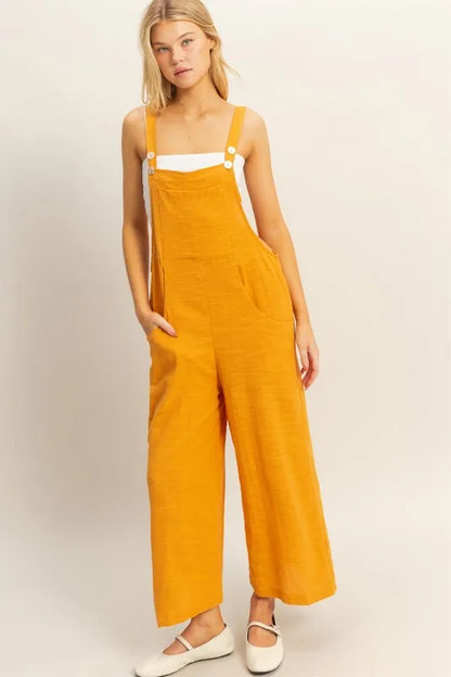 Get trendy with Textured Wide Leg Overall - Jumpsuit available at Styles Code. Grab yours today!