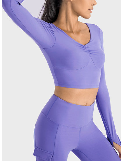 Get trendy with Ruched Cropped Long Sleeve Sports Top - Activewear available at Styles Code. Grab yours today!