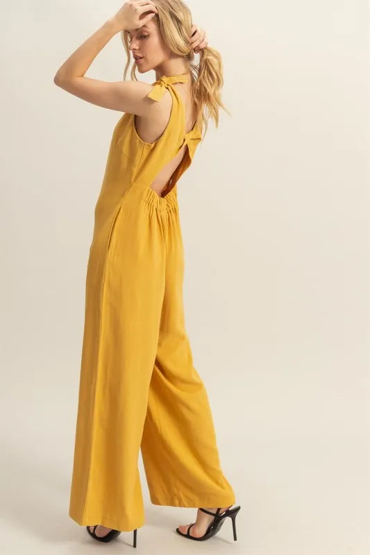 Get trendy with Cutout Wide Leg Jumpsuit - Jumpsuit available at Styles Code. Grab yours today!