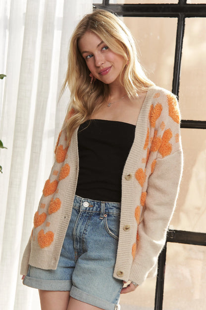 Get trendy with Button Down Heart Cardigan -  available at Styles Code. Grab yours today!