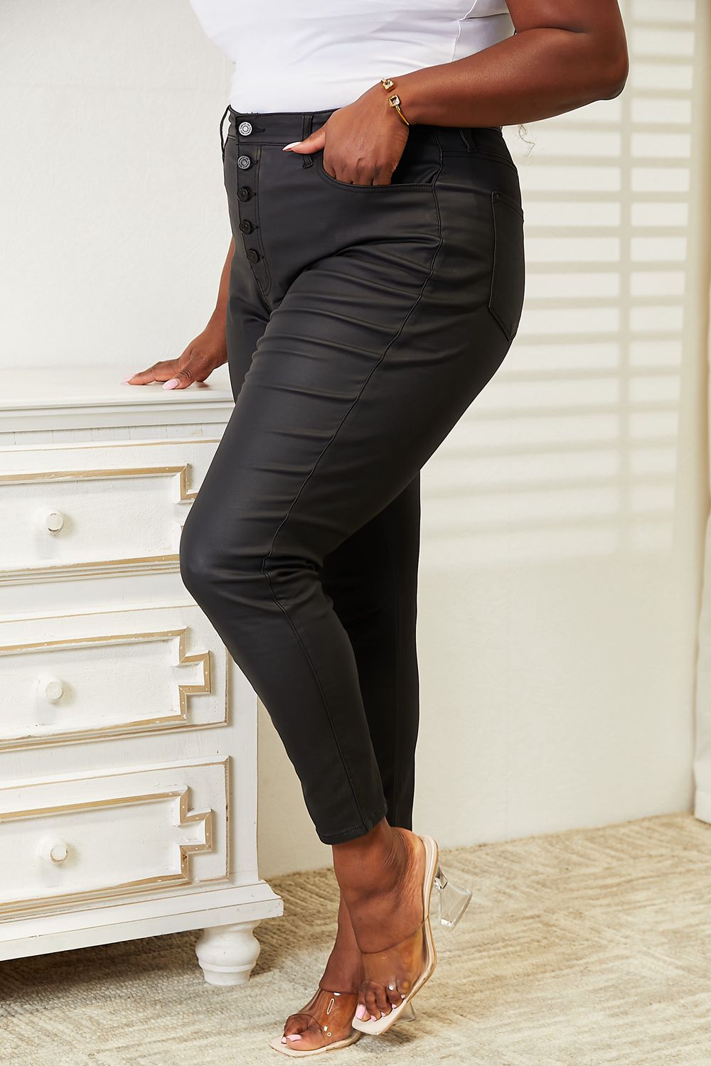 Get trendy with Kancan Full Size High Rise Black Coated Ankle Skinny Jeans - Plus Size available at Styles Code. Grab yours today!