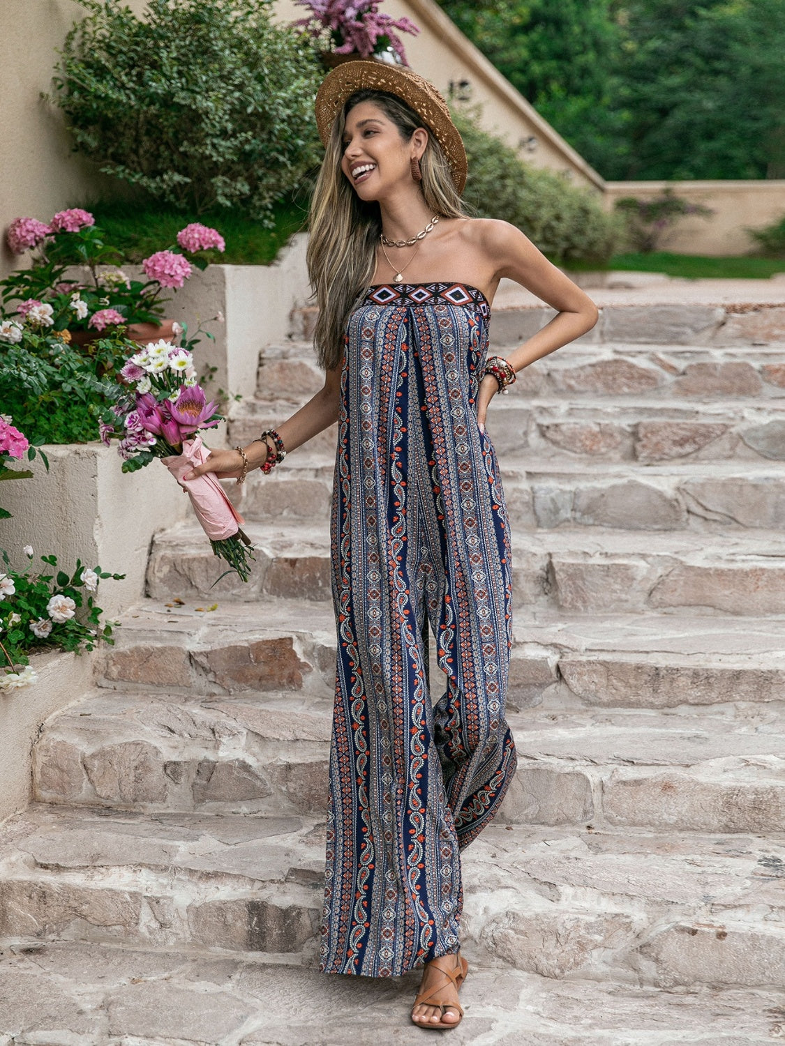 Get trendy with Tied Printed Tube Wide Leg Jumpsuit - Jumpsuit available at Styles Code. Grab yours today!