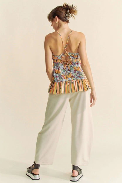 Get trendy with Floral Sleeveless Ruffle Top - Top available at Styles Code. Grab yours today!