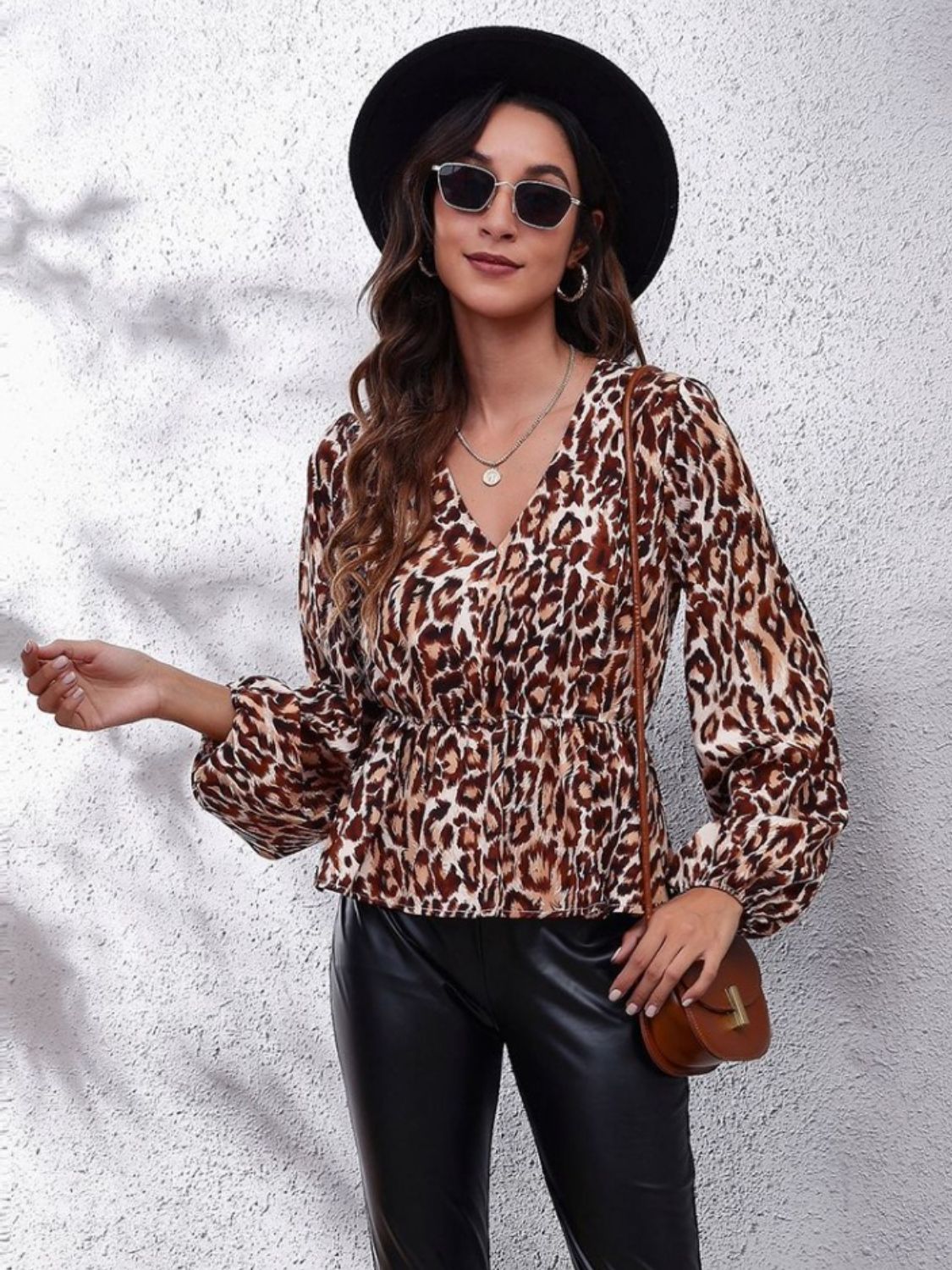 Get trendy with Ruched Printed V-Neck Long Sleeve Blouse - Blouse available at Styles Code. Grab yours today!