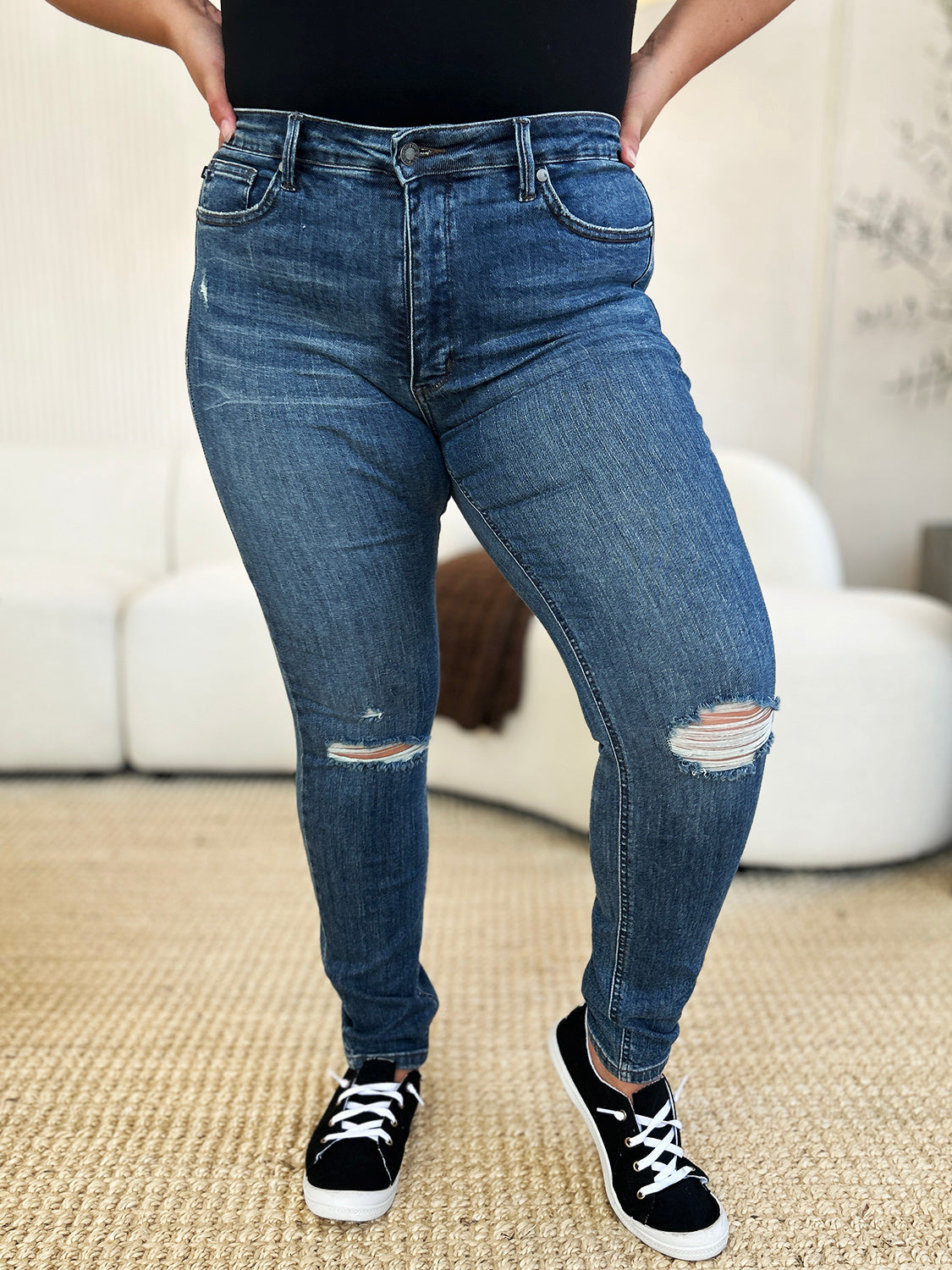 Get trendy with Judy Blue Full Size Mid Waist Distressed Slim Jeans - Plus Size available at Styles Code. Grab yours today!