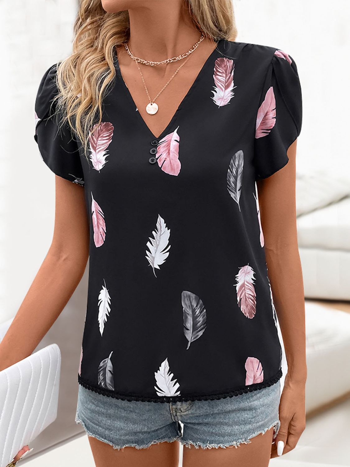 Get trendy with Printed V-Neck Short Sleeve Blouse - Top available at Styles Code. Grab yours today!