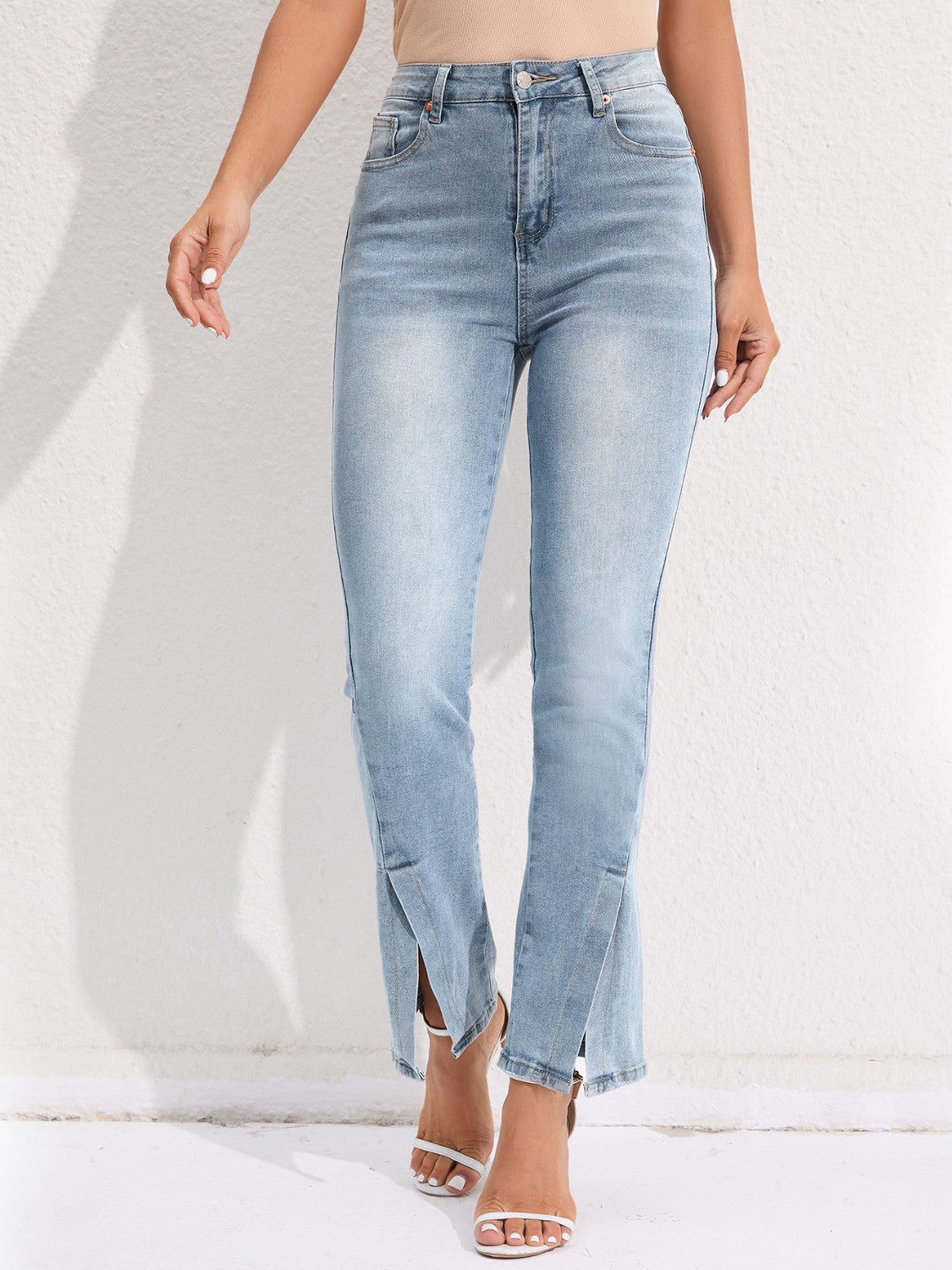 Get trendy with Slit Buttoned Jeans with Pockets - Jeans available at Styles Code. Grab yours today!