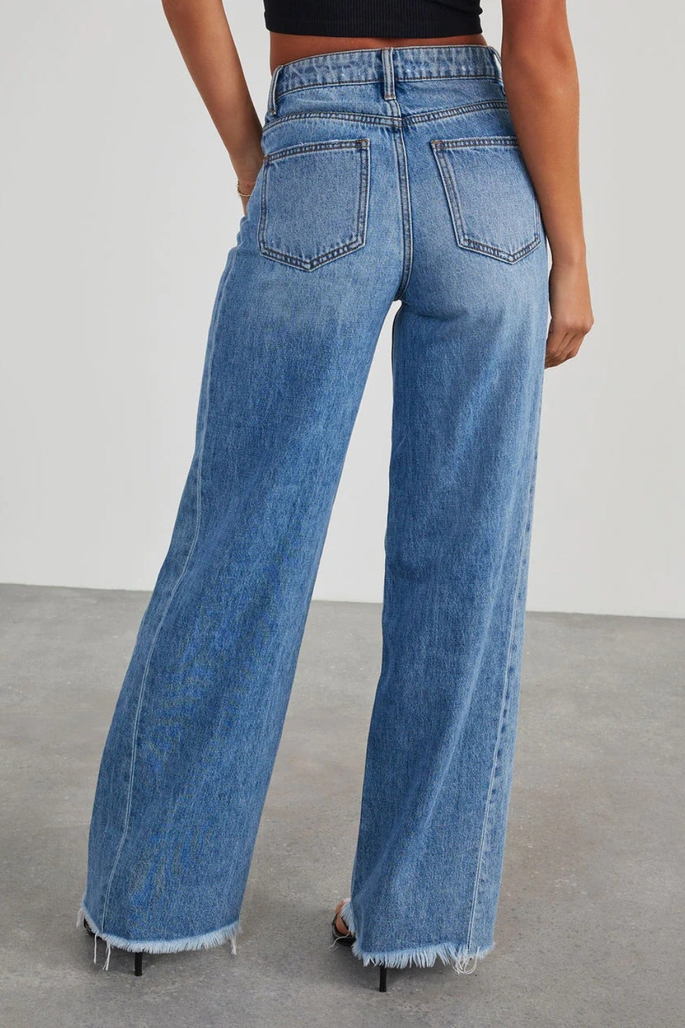 Get trendy with Raw Hem Wide Leg Jeans with Pockets - Jeans available at Styles Code. Grab yours today!