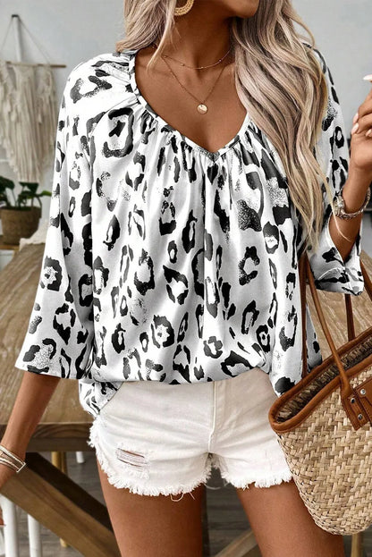 Get trendy with V-Neck Three-Quarter Sleeve Blouse - Blouse available at Styles Code. Grab yours today!